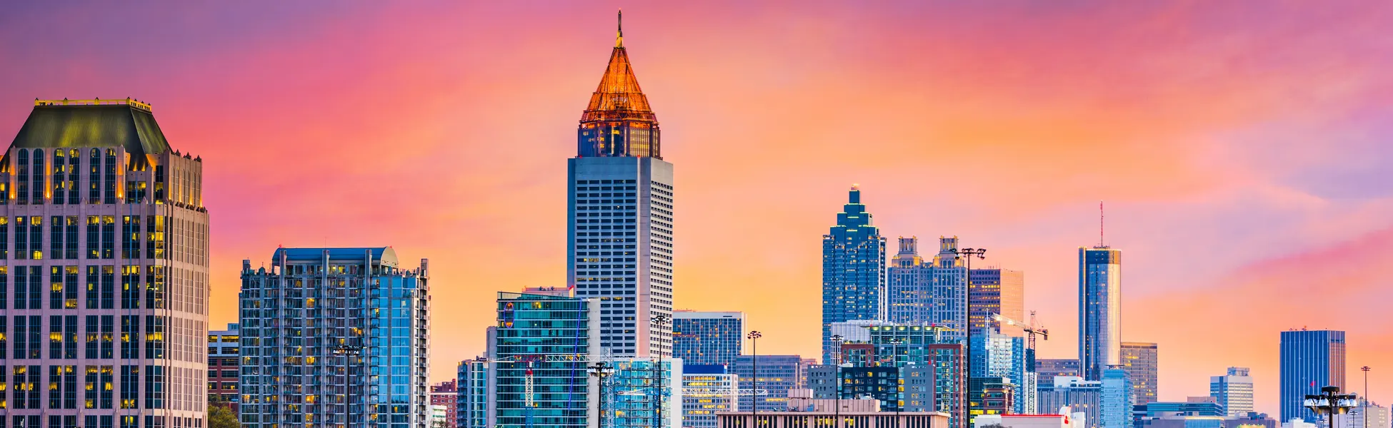 Neon color image of a band playing and people singing along