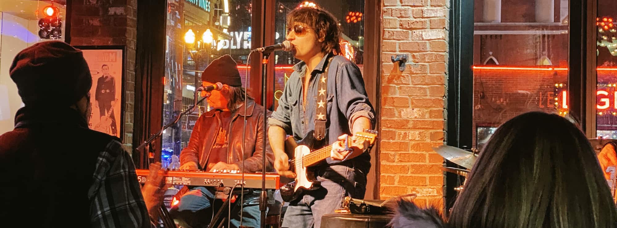bar singer on guitar in Atlanta